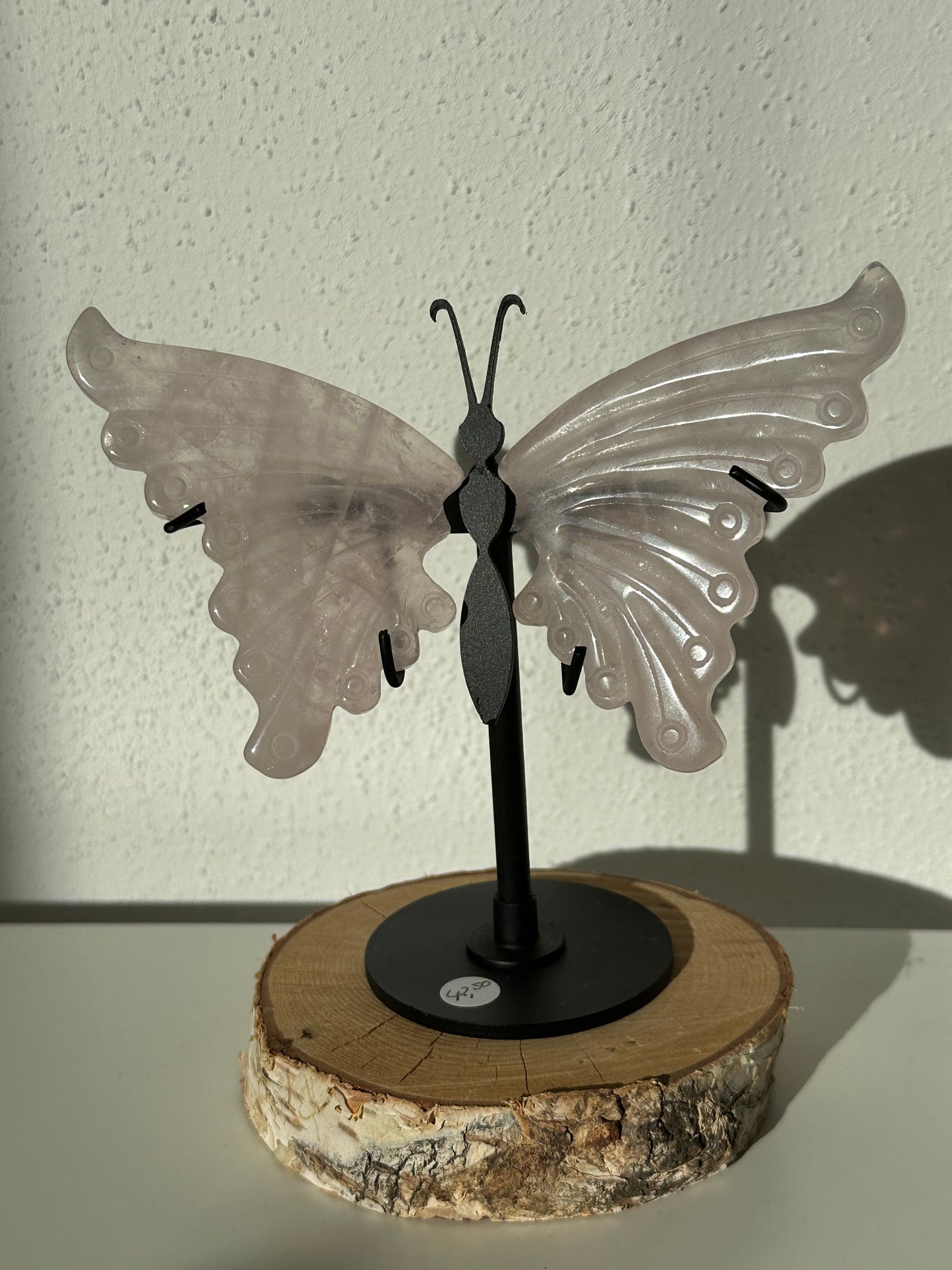 Rozenkwarts vlinder op standaard
