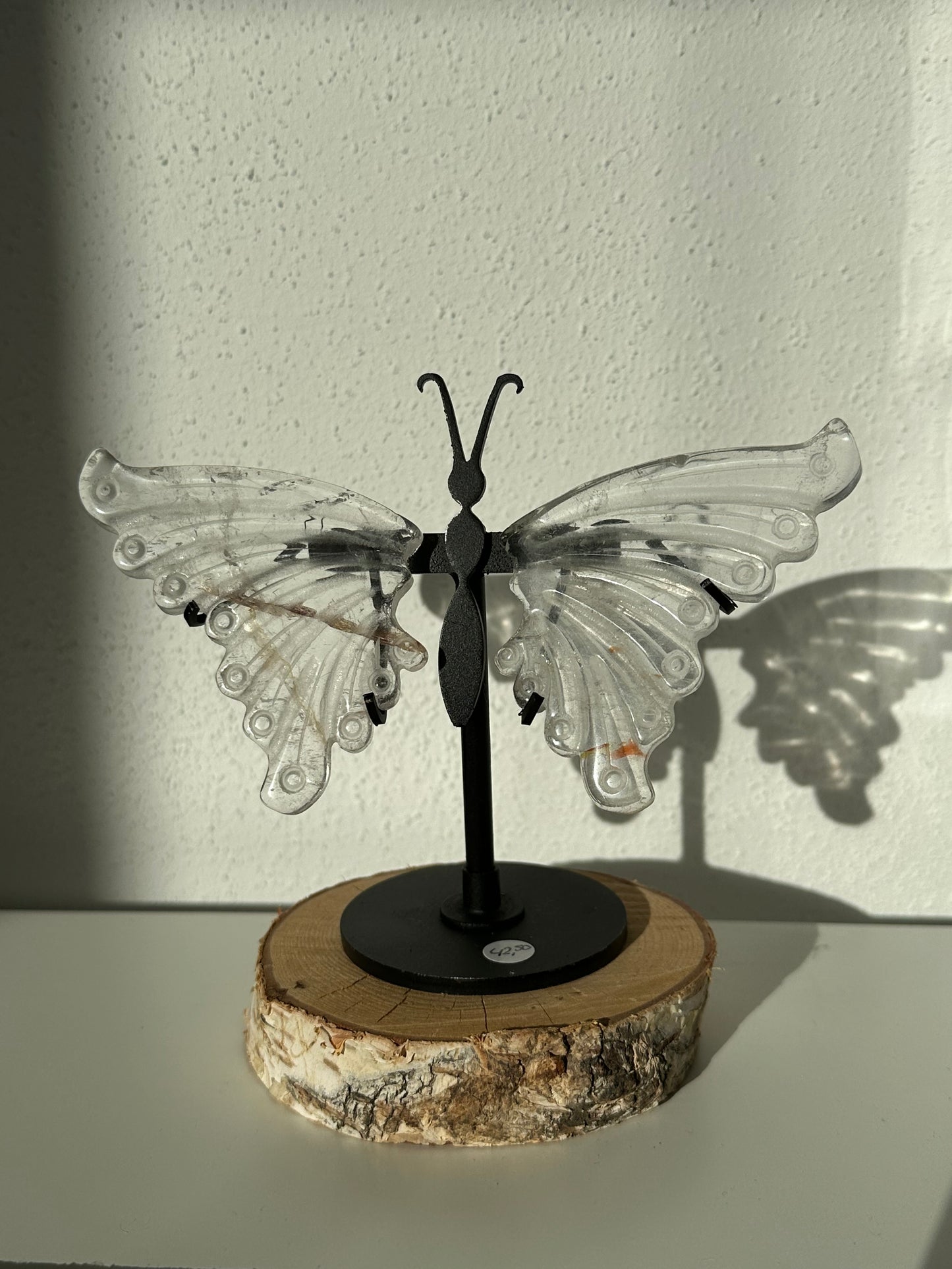 Bergkristal vlinder op standaard